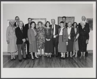 Group at a Prendergast Exhibit opening at WCMA; (L to R) Mrs. Boyd, John Boyd, Paul Maynard, Joe Butler, Antoinette Maynard, Eugénie Prendergast, Carol Derby, unknown, unknown, unknown, Cathy Genvert, Diane Burns, Mr. and Mrs. Brumbaugh
