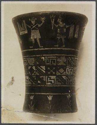 Greek vase with decorative patterns & figures