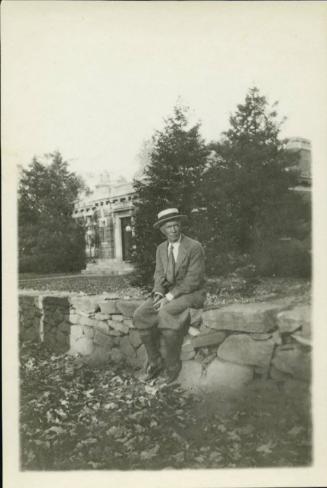 1927-1929 series of Eugénie and Charles Prendergast and Vankemmel family members in France; Charles Prendergast seated outdoors