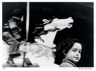 Gypsy girl with merry-go-round (from Photographer's Choice: Harold Feinstein-Decade's Four)