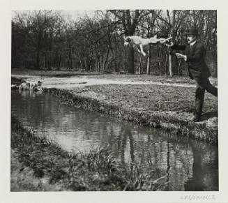 1912 Paris: Bois de Boulogne Monsieur Folletête, le secretaire de papa, avec son chien "Tupy" (from "The Lartigue Portfolio" 1903-1916")