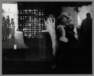 Untitled [man with telephone, figure with raised arm, group of figures]