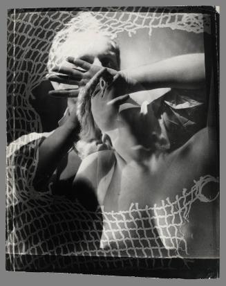 Untitled [man with nude woman with arms raised above head]