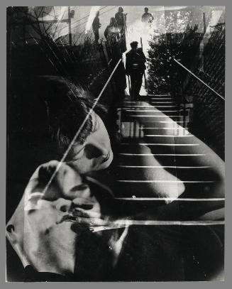 Untitled [reclining female, man on stairs]