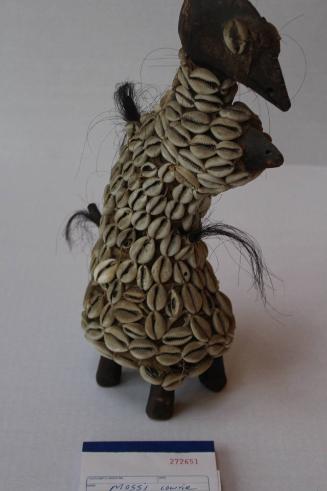 Cowrie covered maternity figure (shrine figure)