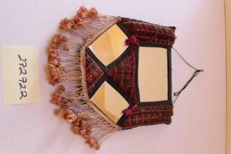 Mirror with embroidered surround