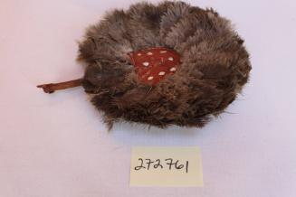 Ostrich feather fan with tooled leather