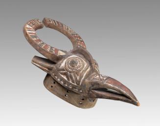 Bird mask with bird atop