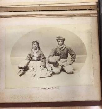 Hawaiian "hula" Dancers Seated