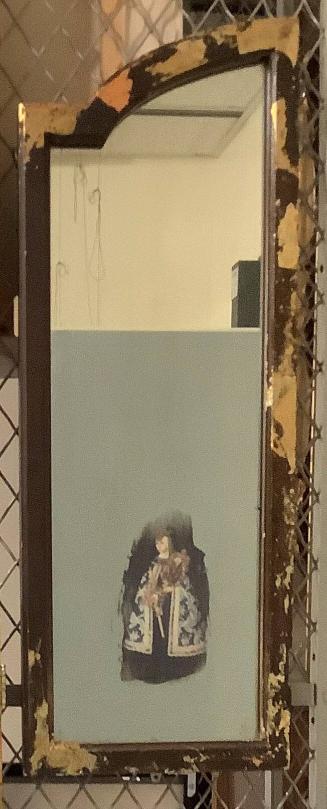 Left side mirror from The Library of Sor Juana Inez de la Cruz (from the installation, Venus Envy Chapter Two:  The Harem and Other Enclosures, 1994)