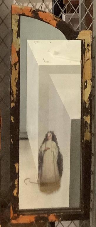Right side mirror from The Library of Sor Juana Inez de la Cruz (from the installation, Venus Envy Chapter Two:  The Harem and Other Enclosures, 1994)