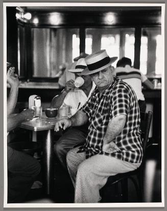 Man in Donut Shop, New Orleans