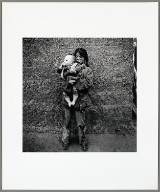 A Mentally Handicapped Muslim Girl with Her Nephew, Xihaigu, Ningxia Province (from "The Chinese")