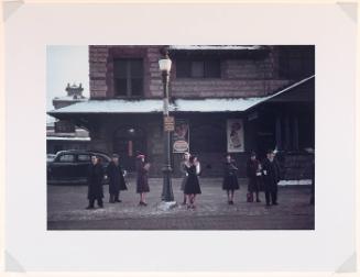 Commuters who have just come off the train, waiting for the bus to go home. Lowell, MA, Jan. 1941