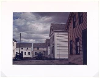 A square with old houses in an old fishing village, Stonington, CT