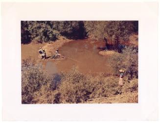 Negroes fishing in creek...