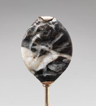 Oval stone with engraving of an animal